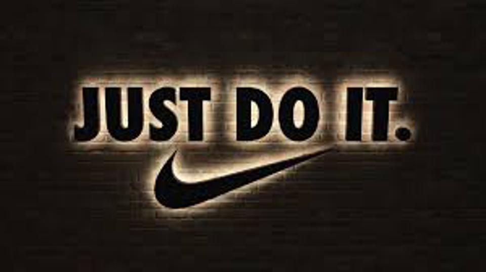 nike's brand voice is demonstrated in its straightforward slogan